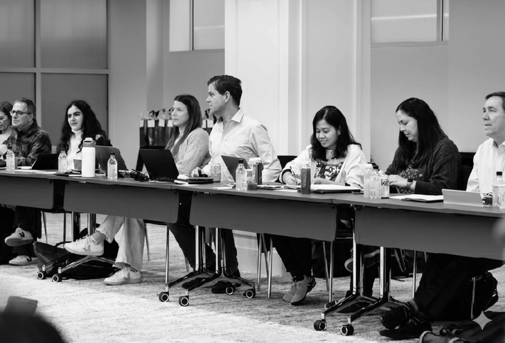 black and white image of HLG employees at company offsite