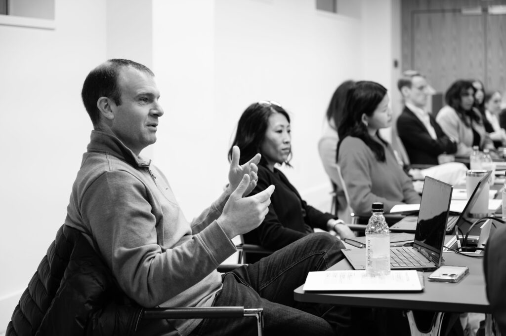 black and white image of HLG employees at company offsite